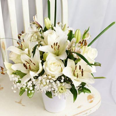 Alabaster Mixed Lily Arrangement. Lilies, Alstroemeria, Roses, Daisies, Baby’s Breath, and Greens in a Ceramic Vessel. Mixed Floral Gifts from Heart & Thorn USA - Same Day USA Delivery.