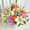 Spring Rose & Lily Arrangement. Roses, Daisies, Lilies, Alstroemeria, and Greens in a Ceramic Vessel. Mixed Flower Gifts from Heart & Thorn USA - Same Day USA Delivery.