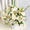 Everyday Luxury Flowers & Wine Gift. Lilies, Alstroemeria, Roses, Daisies, Baby’s Breath, and Greens in a Ceramic Vessel. Flower Gifts from Heart & Thorn USA - Same Day USA Delivery.
